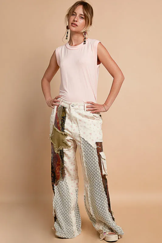 Designed relaxed fit pants in printed twill with patchwork detail.